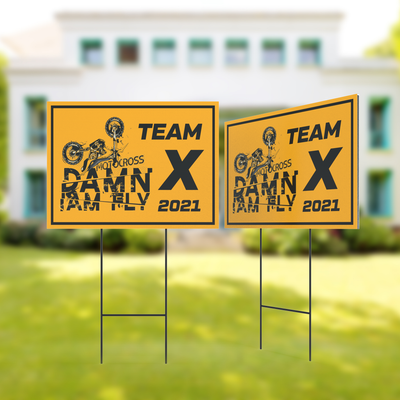 Custom printed yard signs on a lawn